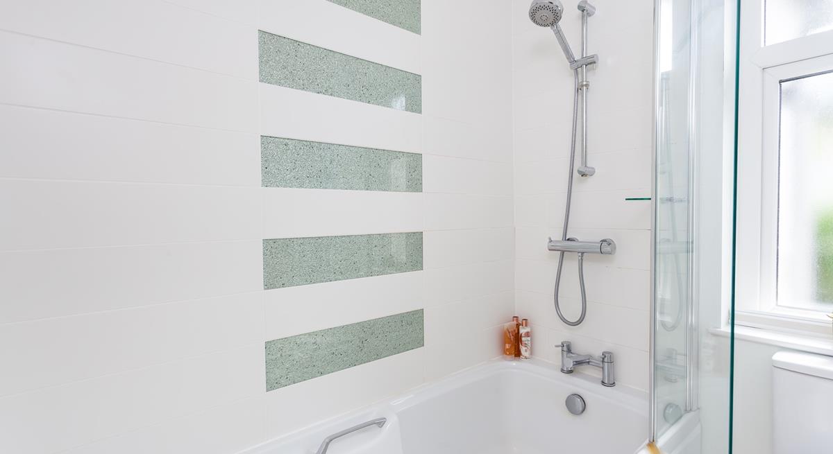 Wash off sandy toes in the shower after a day on Porthmeor.