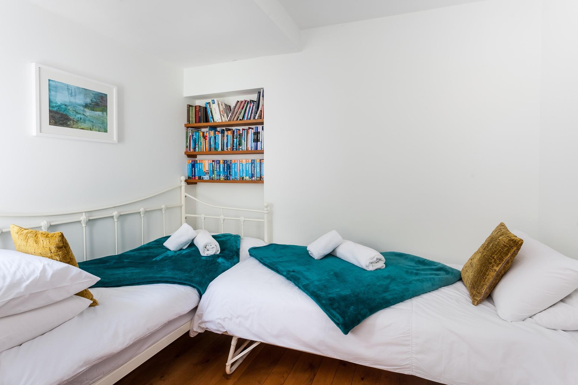 Bedroom 2 has twin beds perfect for adults or children.