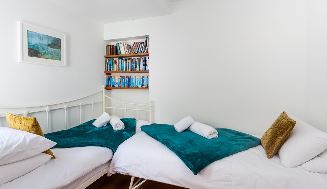 Bedroom 2 has twin beds perfect for adults or children.