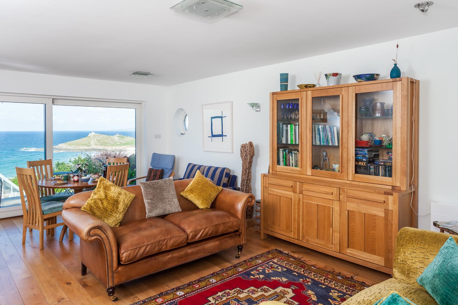 The dining table is positioned perfectly to enjoy the view at meal times.