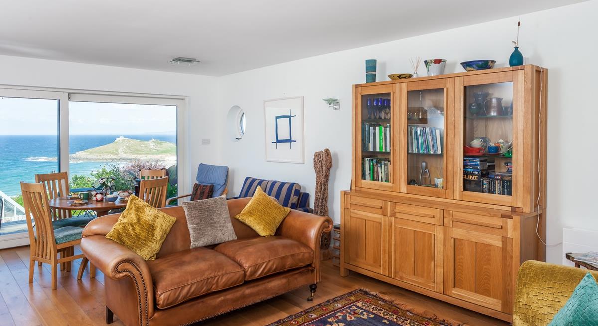 The dining table is positioned perfectly to enjoy the view at meal times.