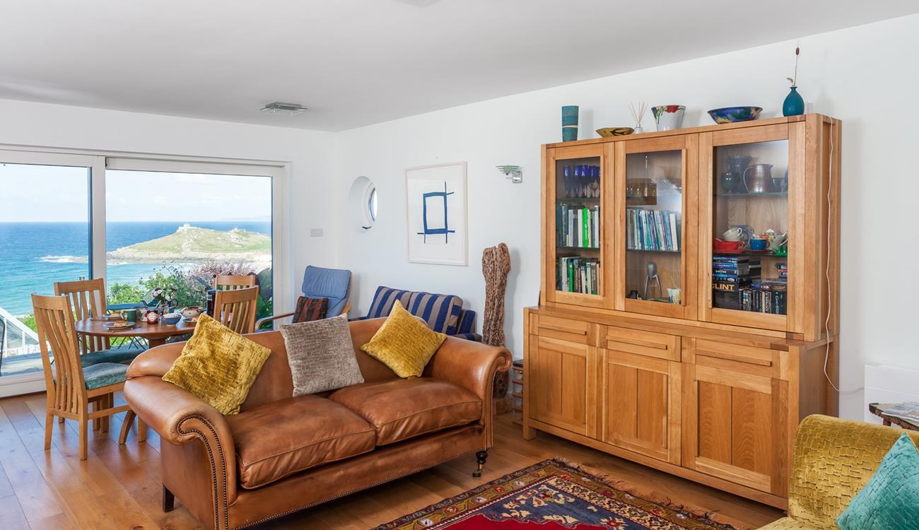 The dining table is positioned perfectly to enjoy the view at meal times.