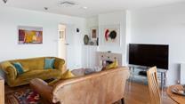 Relax in the sitting room after watching the sun come down on the terrace.