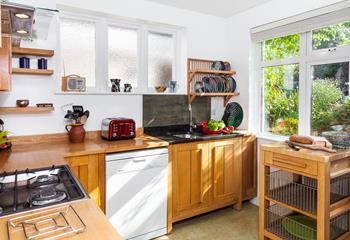 The kitchen is fully equipped for cooking delicious meals.