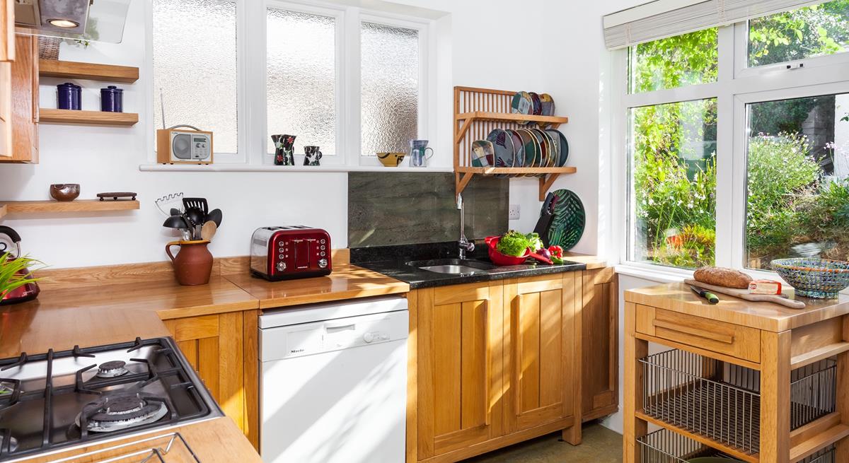 The kitchen is fully equipped for cooking delicious meals.