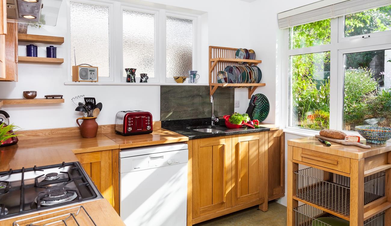 The kitchen is fully equipped for cooking delicious meals.