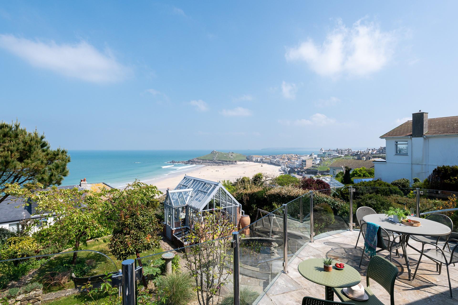 The balcony is the perfect space to relax in the sunshine.