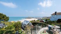 The balcony is the perfect space to relax in the sunshine.