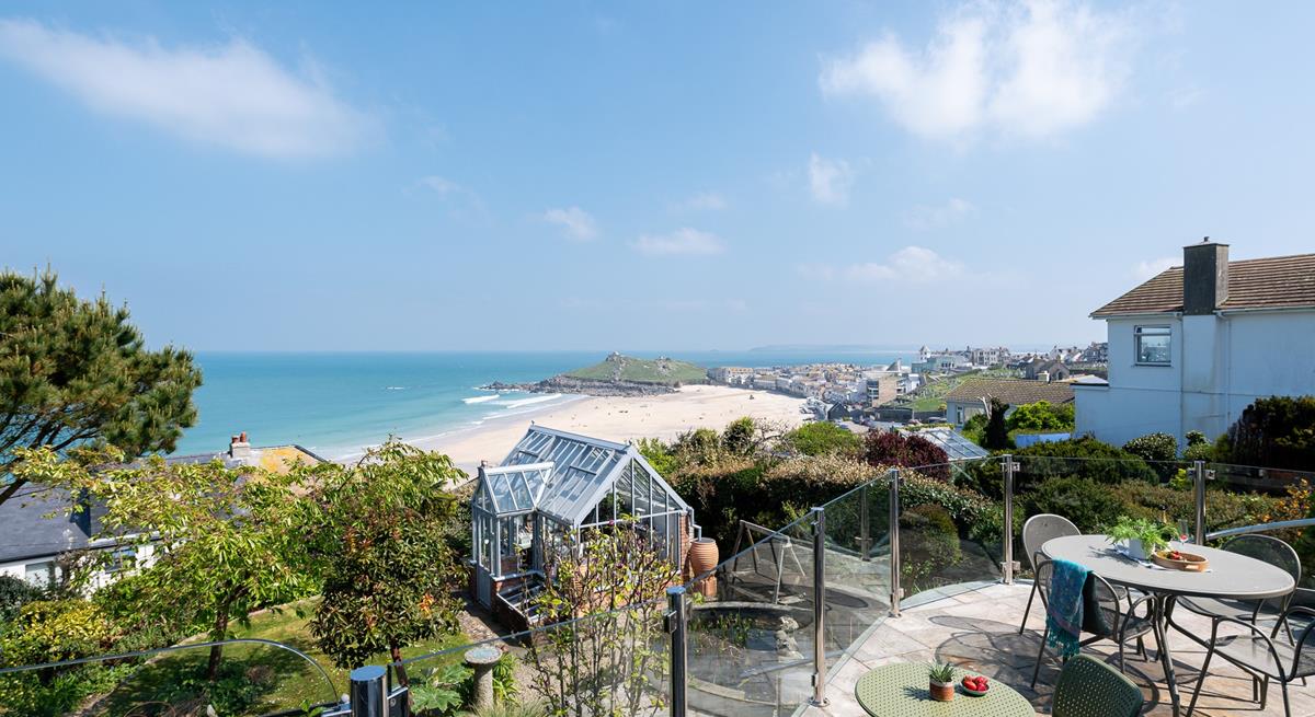 The balcony is the perfect space to relax in the sunshine.