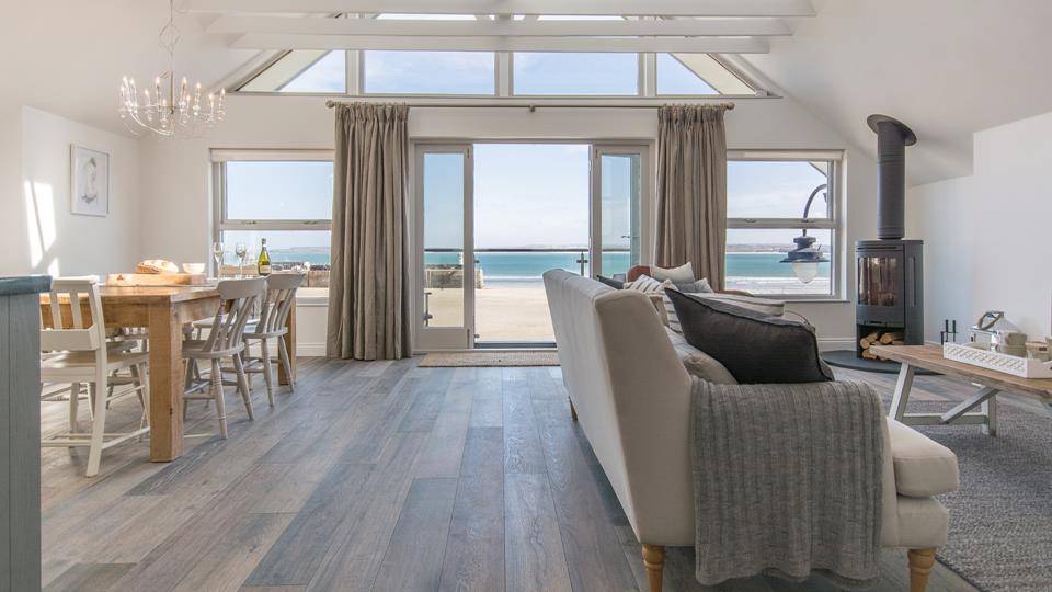 Gorgeous open plan living ensures the space is bright and airy, whilst the apex window makes the most of the incredible views.