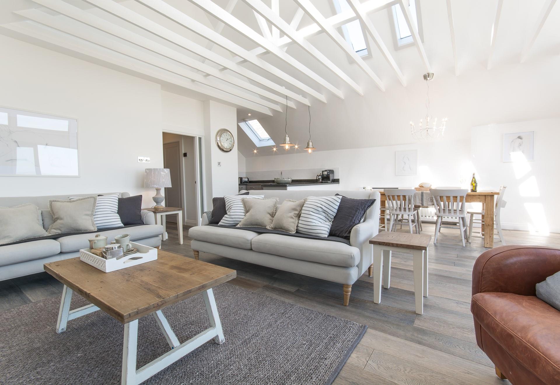 Neutral tones make for a welcoming space to cosy down for a hot chocolate and an evening of movies.