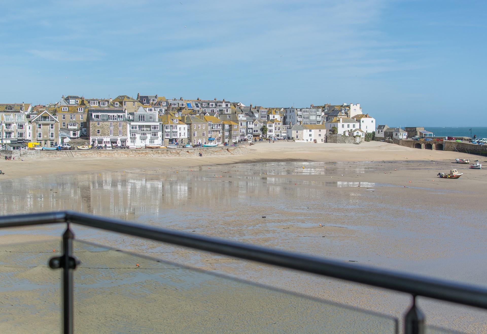 Take your first coffee of the day out onto the balcony and watch St Ives slowly wake up.