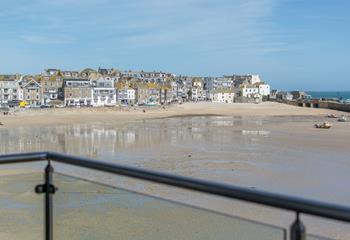 Take your first coffee of the day out onto the balcony and watch St Ives slowly wake up.