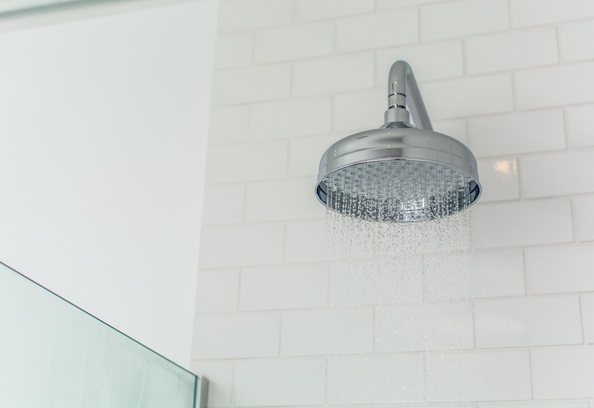 A rainfall showerhead offers extra luxury in the bathroom.