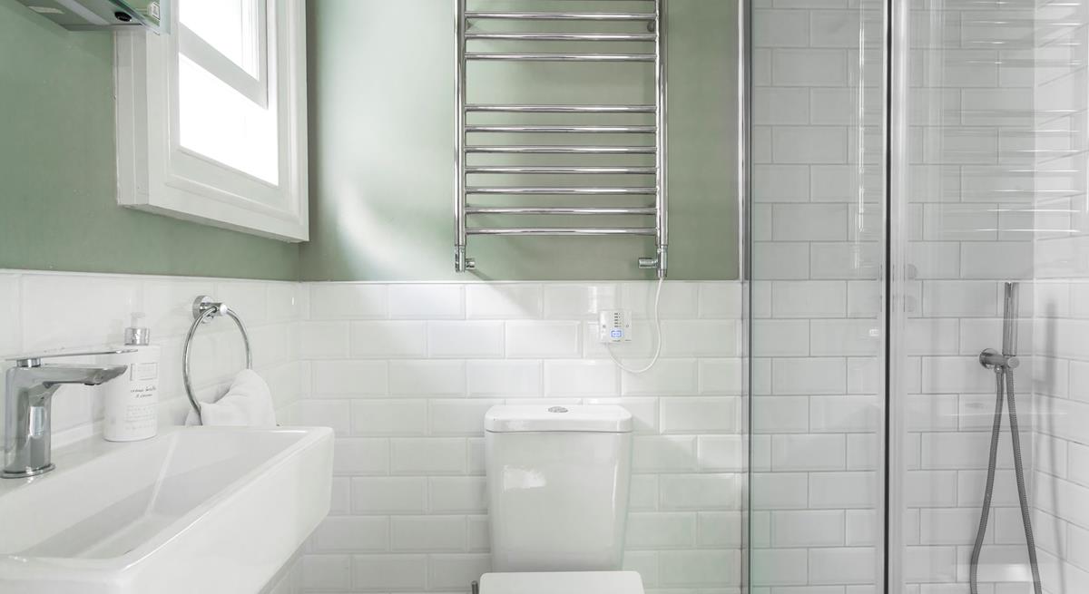 Wash off the sand in your shower and then snuggle up on the sofa for the evening.