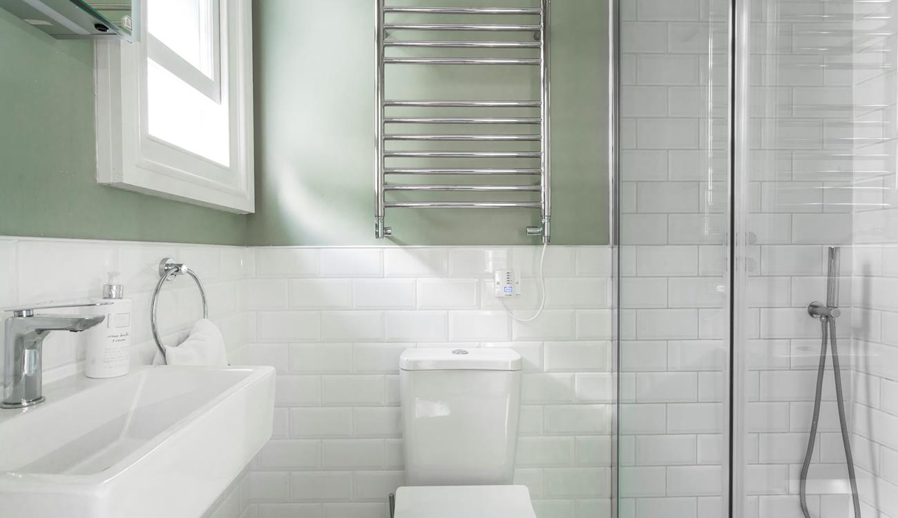 Wash off the sand in your shower and then snuggle up on the sofa for the evening.