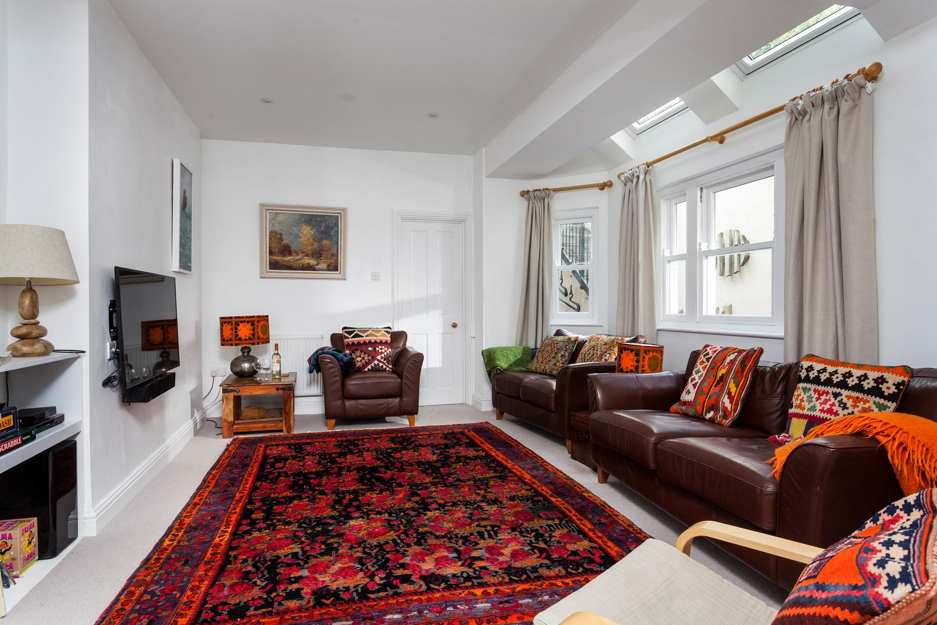 Sit back and relax in your sitting room with your favourite film on the TV.