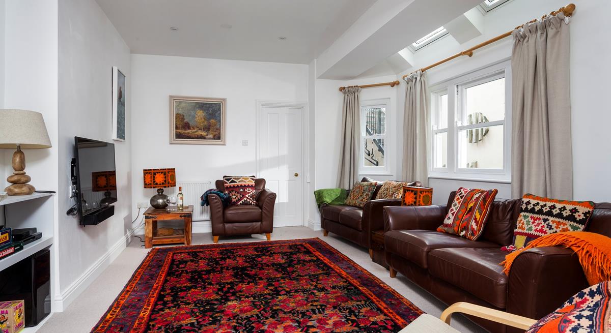 Sit back and relax in your sitting room with your favourite film on the TV.