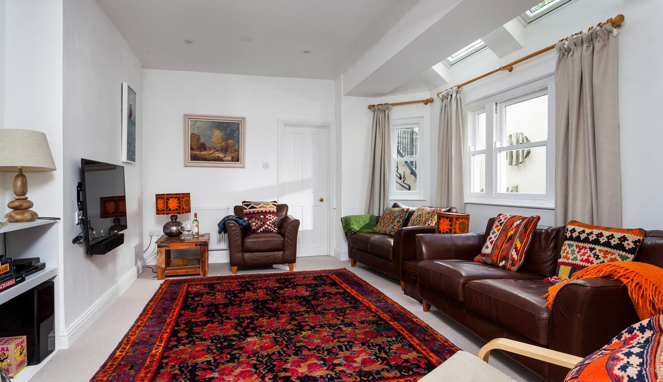 Sit back and relax in your sitting room with your favourite film on the TV.