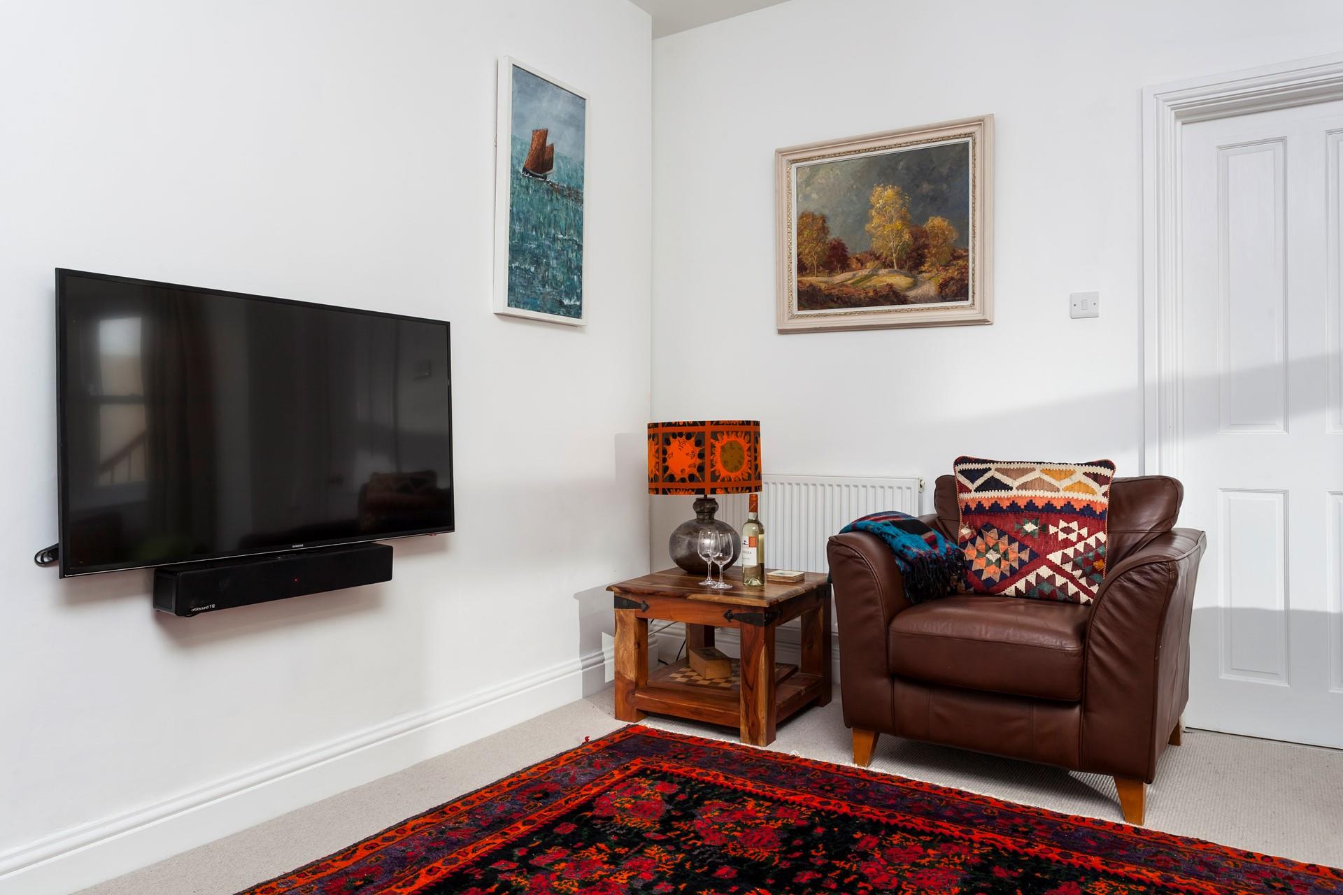 Open a bottle of wine to enjoy after a day sunbathing on the beach.