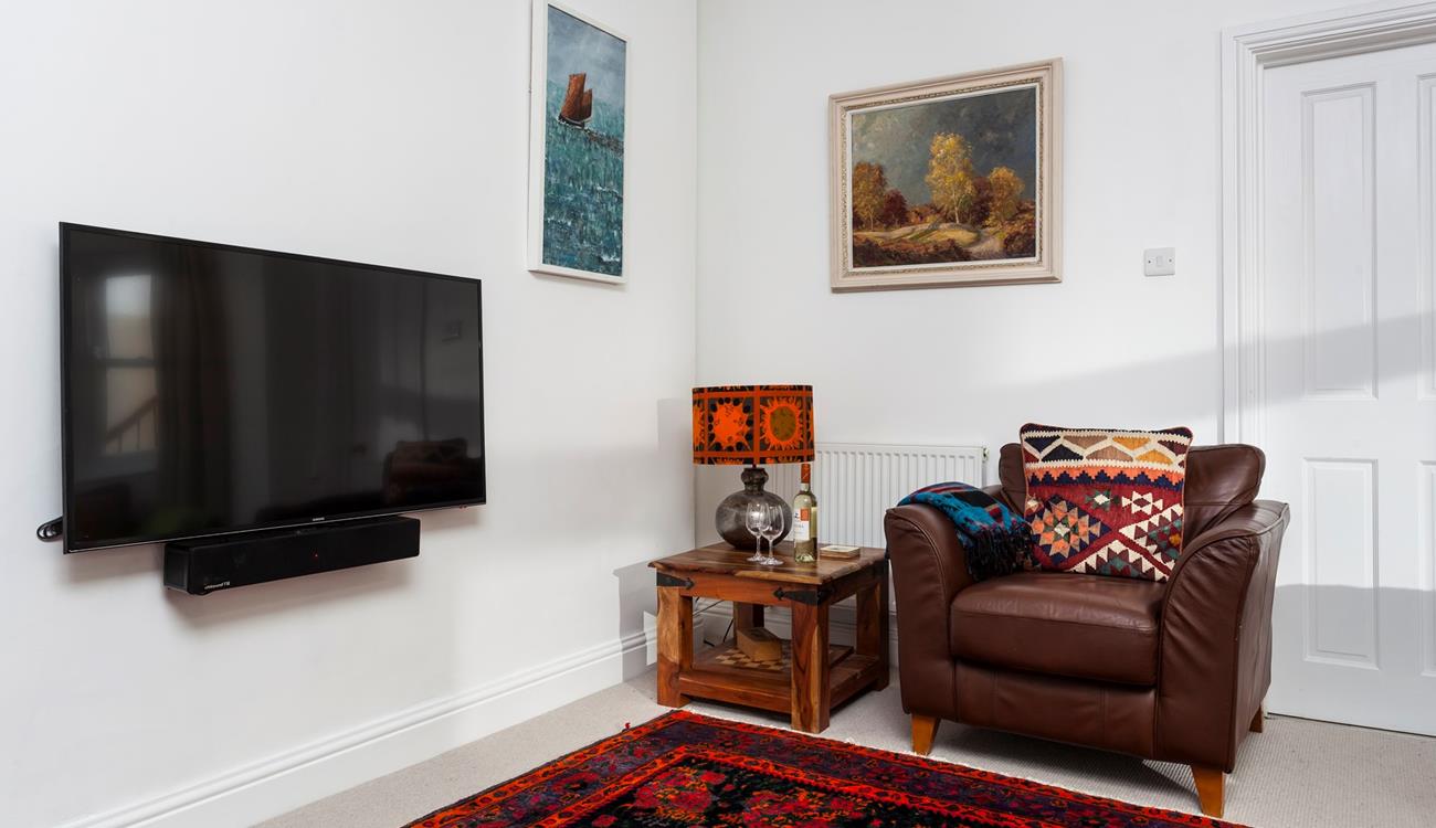 Open a bottle of wine to enjoy after a day sunbathing on the beach.