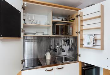 Though small the kitchen is well-equipped making cooking homemade meals a breeze.