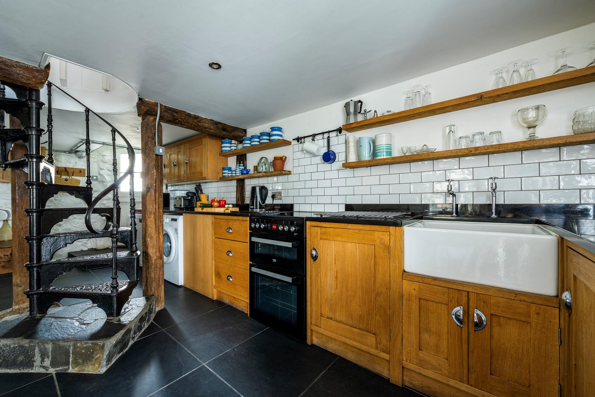 The large kitchen/dining area has all you need to cook delicious meals and enjoy family time.