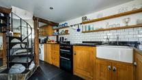 The large kitchen/dining area has all you need to cook delicious meals and enjoy family time.