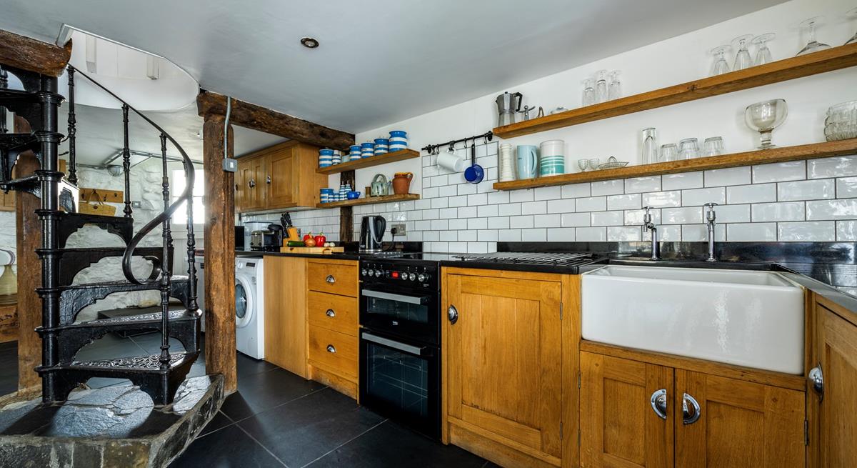 The large kitchen/dining area has all you need to cook delicious meals and enjoy family time.