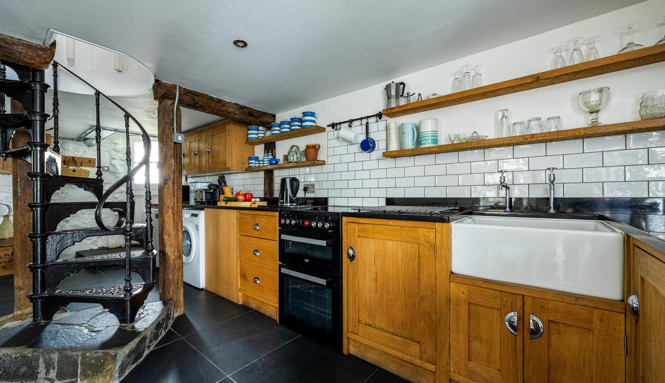 The large kitchen/dining area has all you need to cook delicious meals and enjoy family time.