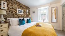 Bedroom 2 has a cosy double bed to rest your head each night. 