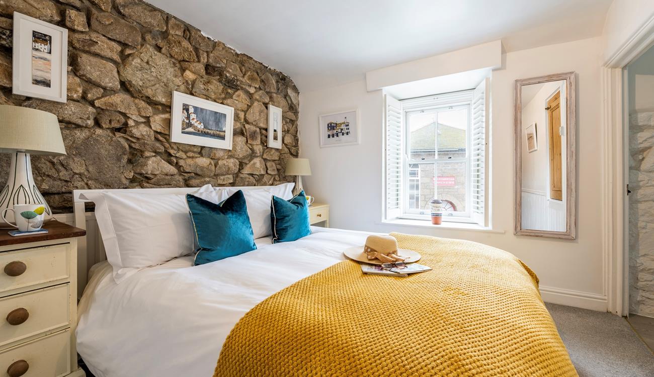 Bedroom 2 has a cosy double bed to rest your head each night. 