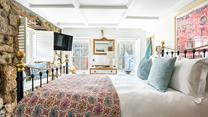 The ground floor bedroom has a king size bed to tuck yourself into for a comfy night's sleep.