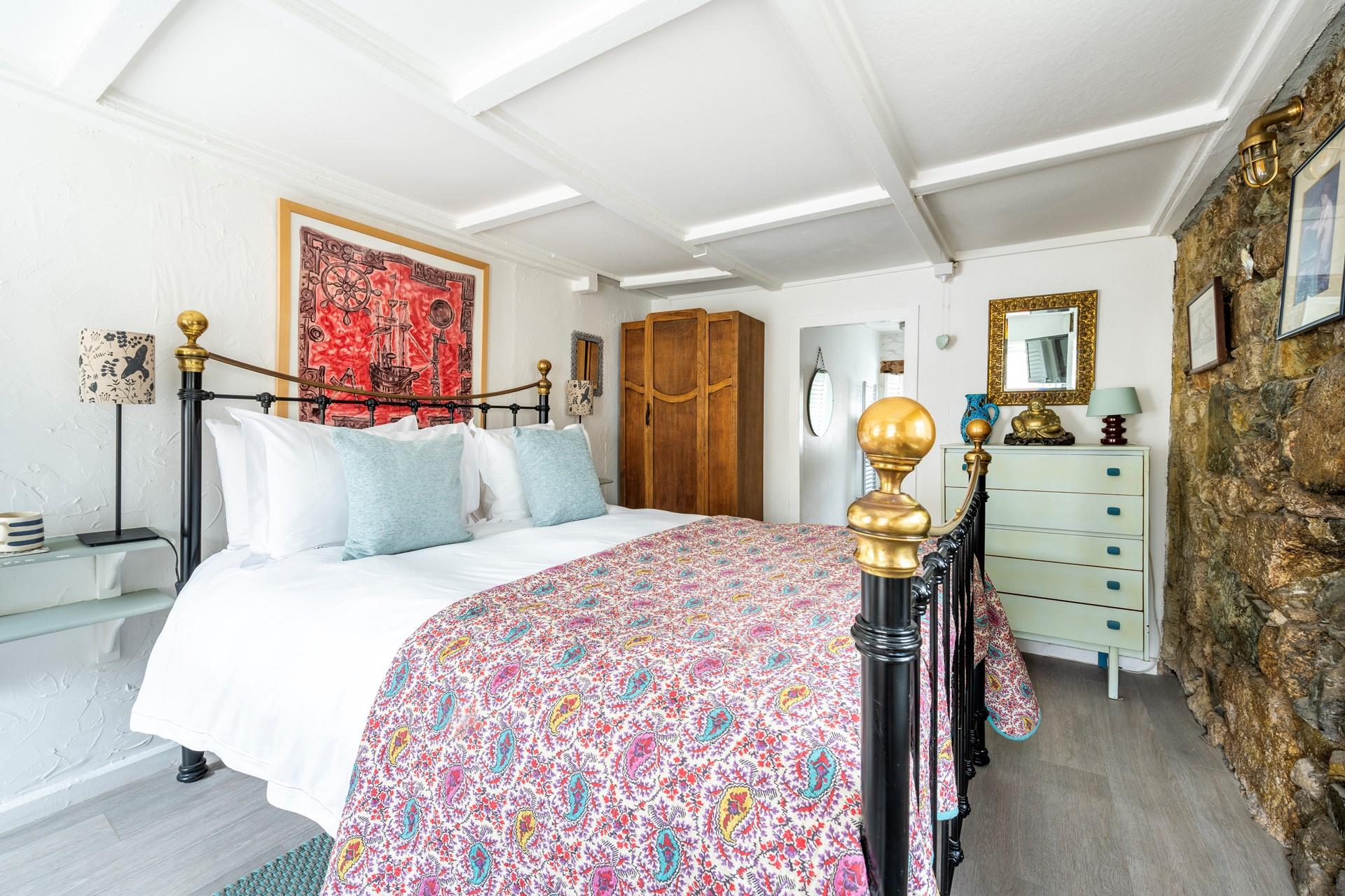 This ground floor bedroom has an en-suite for you to get ready each morning.