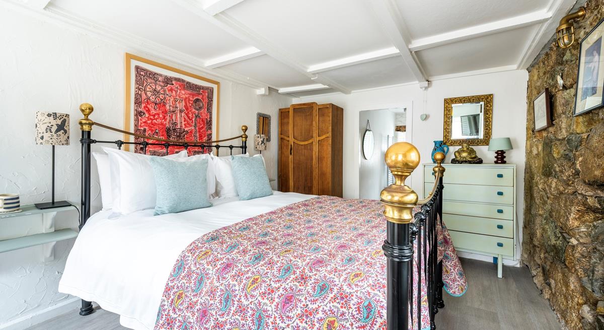 This ground floor bedroom has an en-suite for you to get ready each morning.