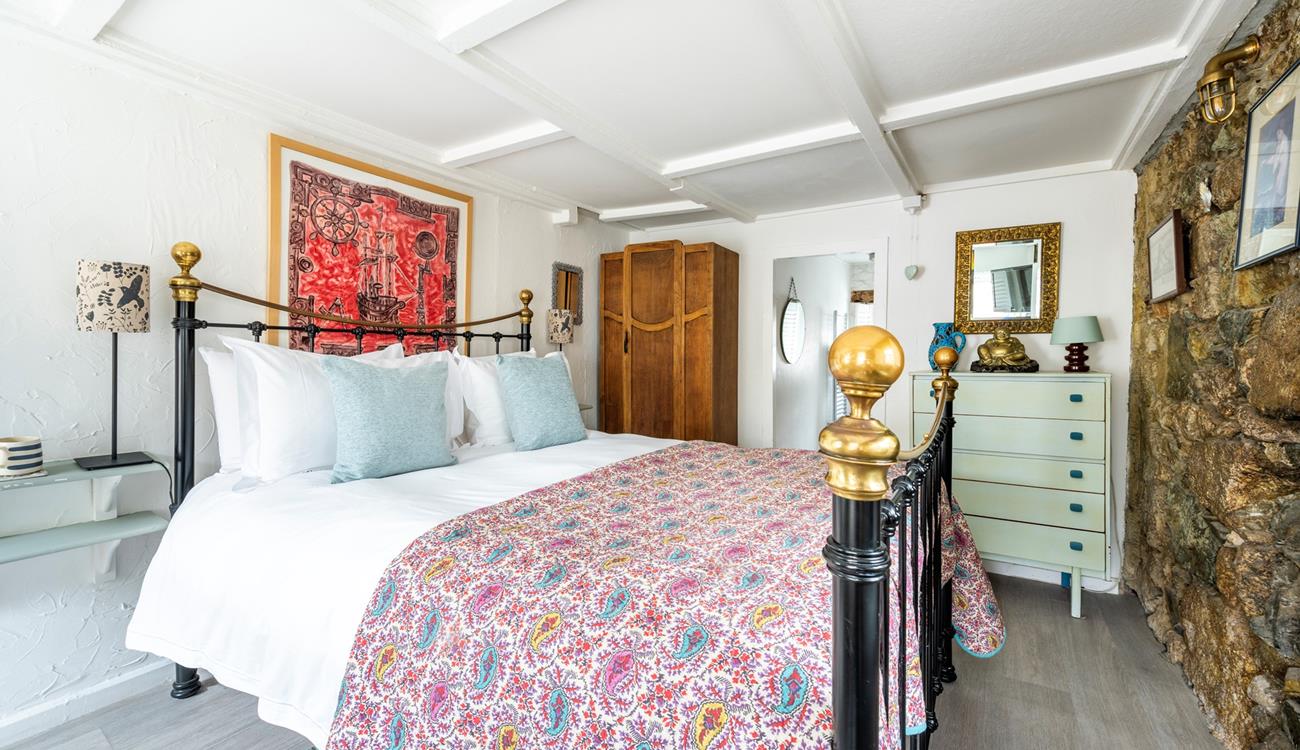 This ground floor bedroom has an en-suite for you to get ready each morning.