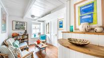 The ground floor sitting room is a quiet space to relax and enjoy some reading.
