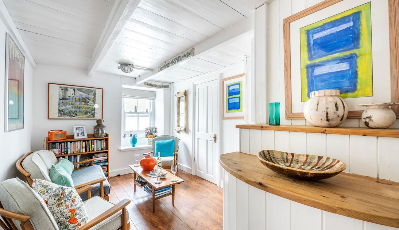 The ground floor sitting room is a quiet space to relax and enjoy some reading.