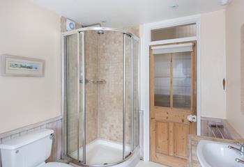 Choose between a shower or a bath when getting ready in the family bathroom. 