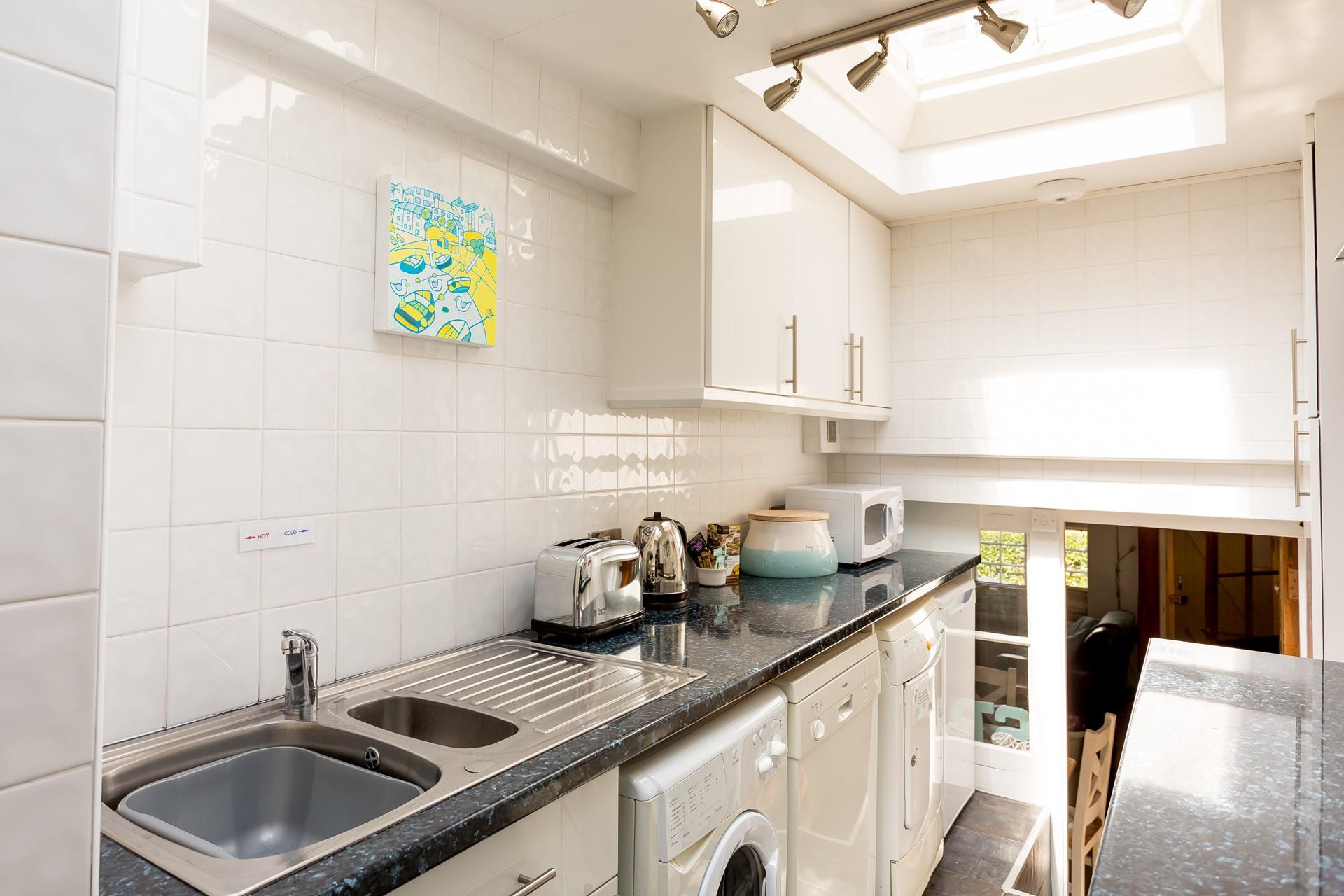 The kitchen is perfectly equipped to rustle up meals for your family.