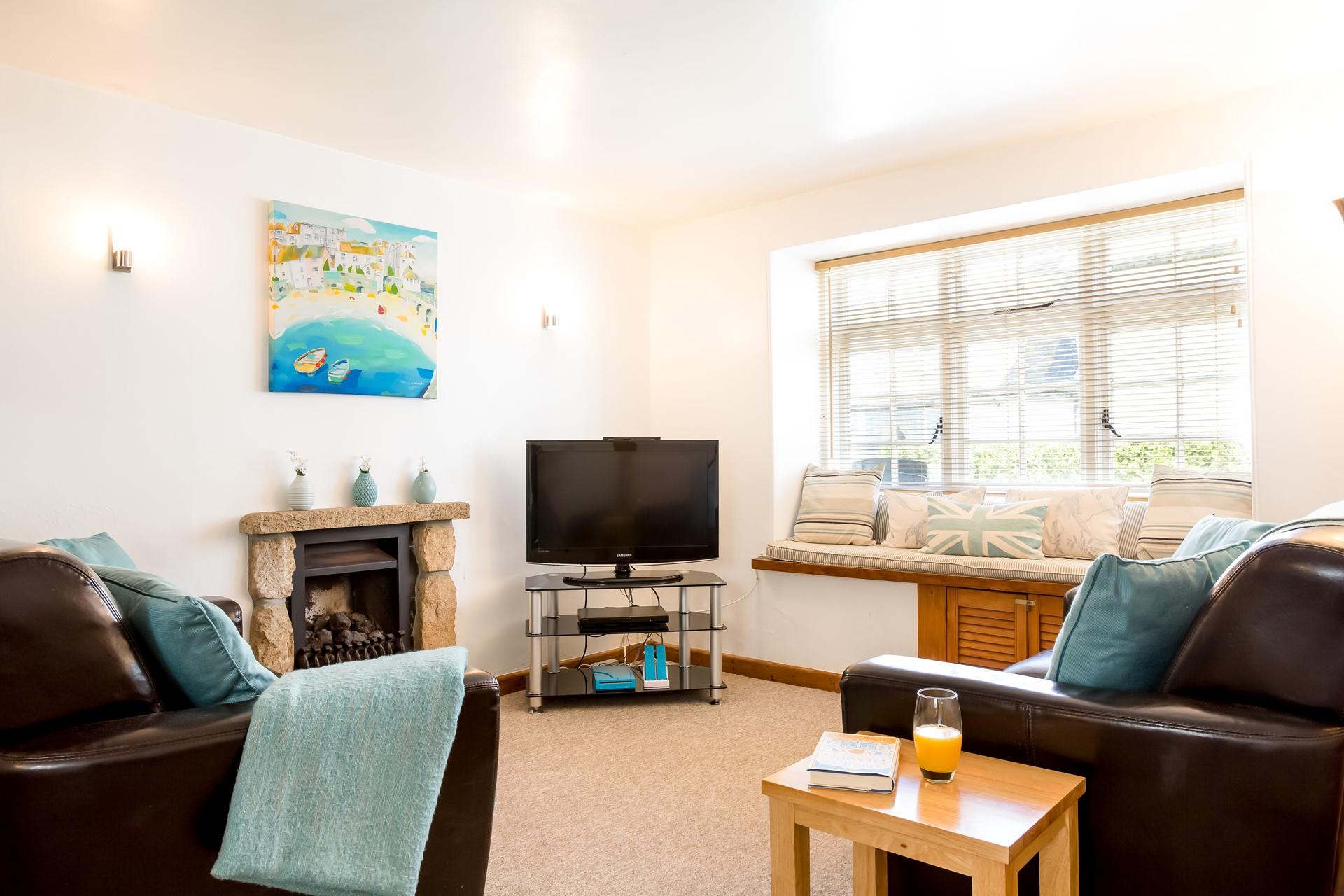 Sitting room with TV/DVD, Wii games console and iPod docking station for all your entertainment needs.