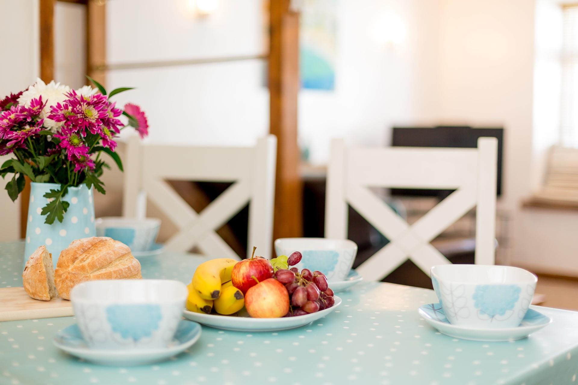 Pick up some fresh ingredients in town to make a delicious meal.