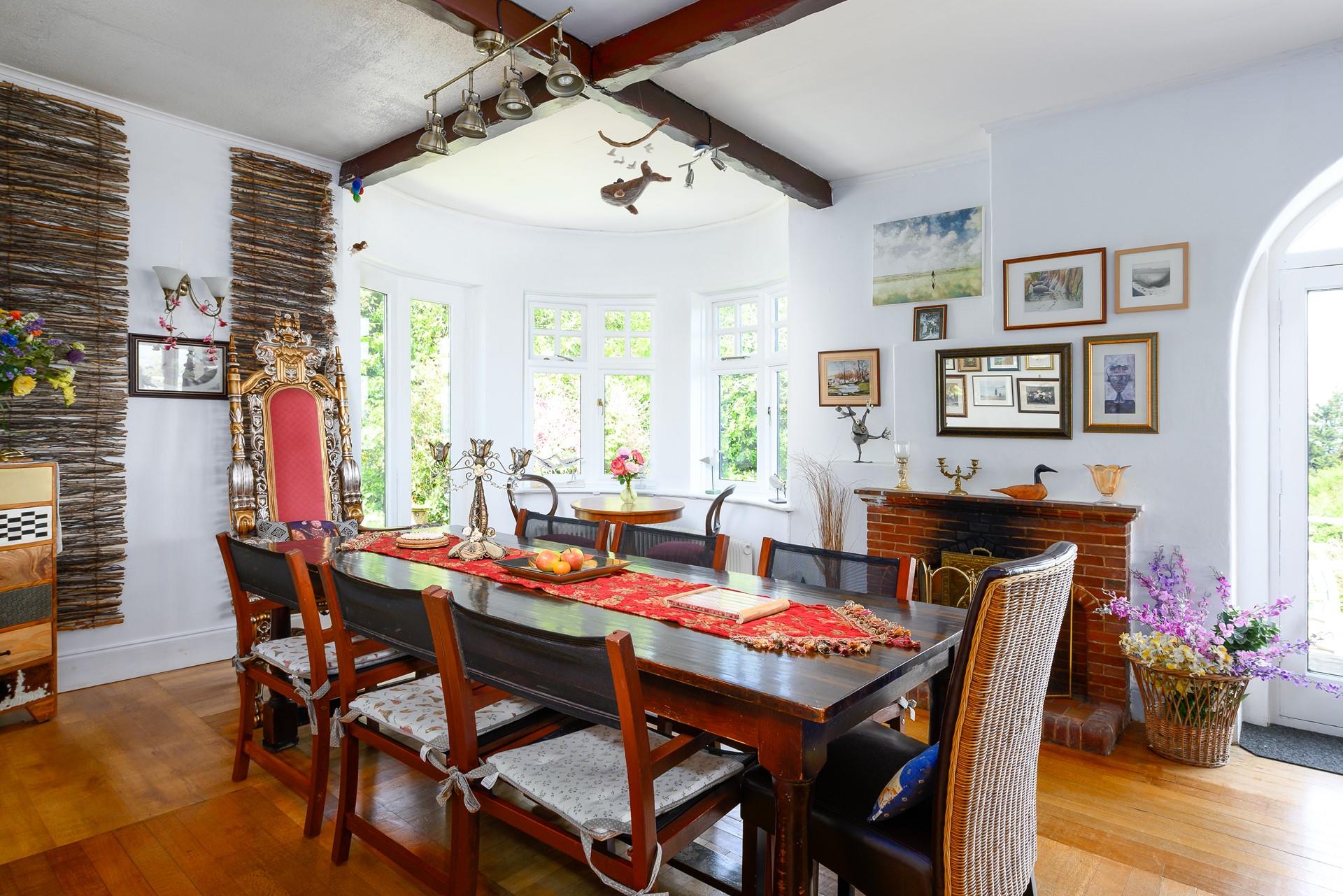 Enjoy meals together at the grand dining table.