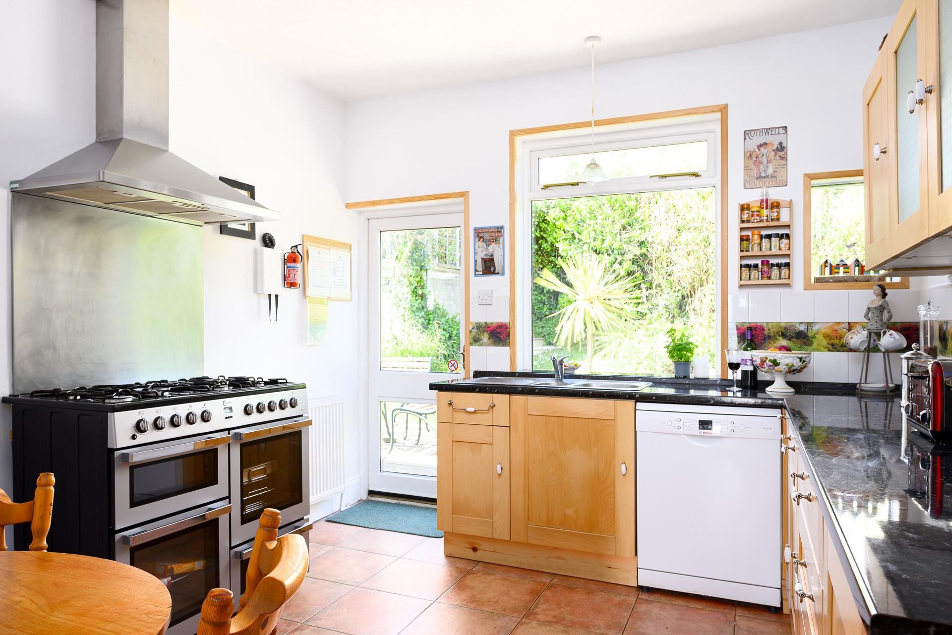 Cook up a feast on the large range cooker, ideal for larger parties. 