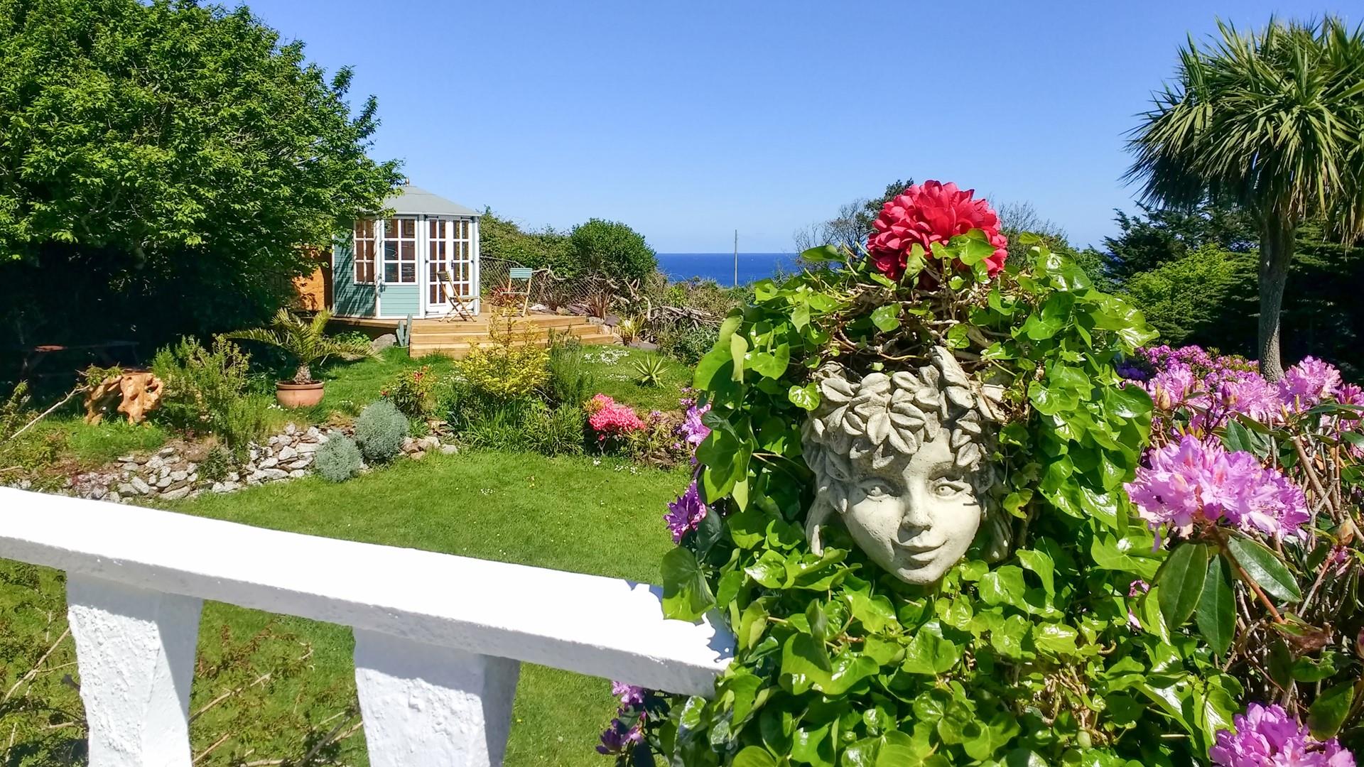 The garden is a delight with hidden wonders to be discovered at every turn.