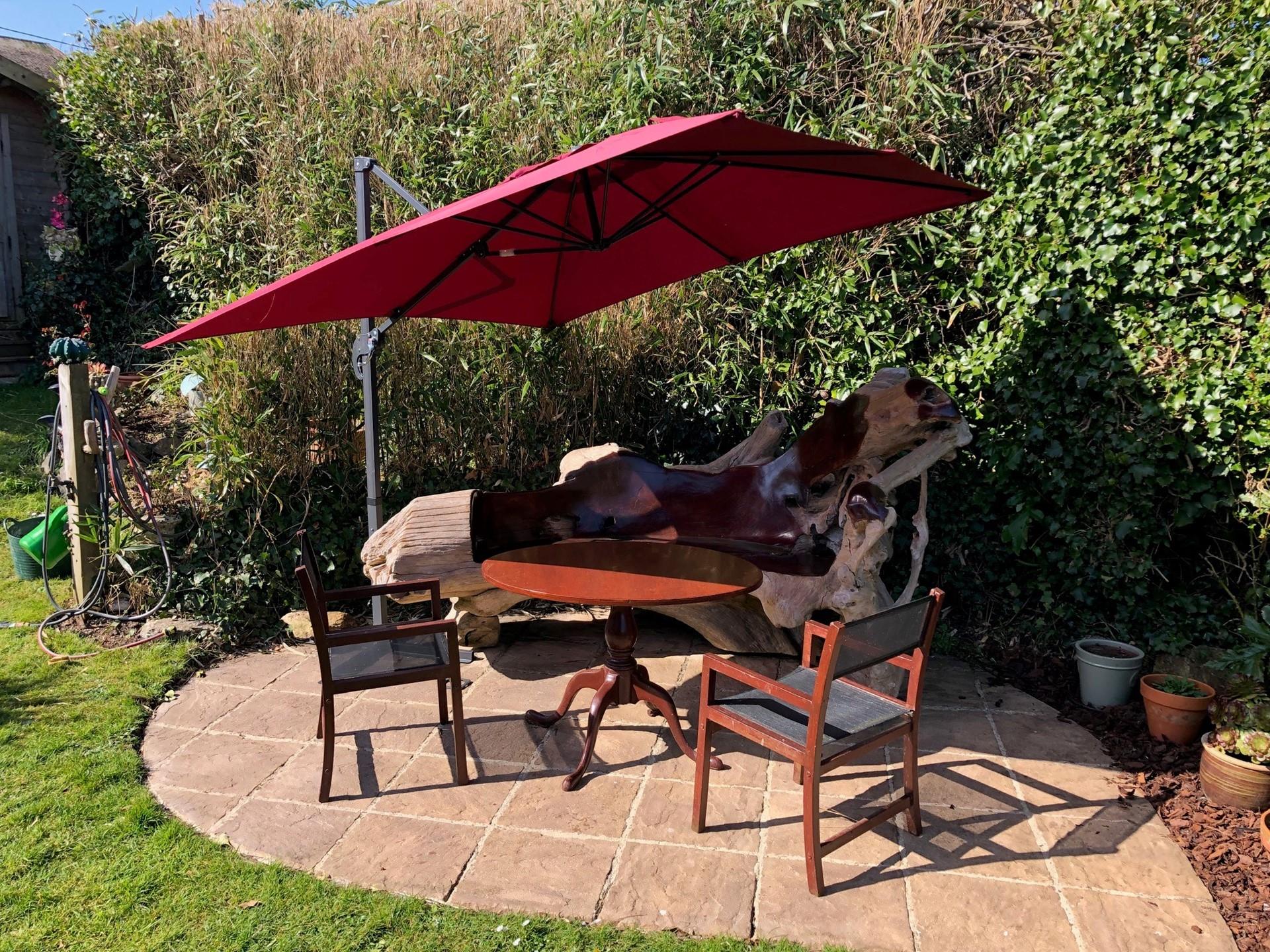 Pour yourself a glass of wine, grab a book and take a seat on the hand-crafted, one-of-a-kind bench in the garden. 