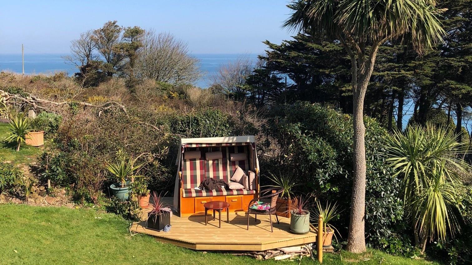 There are plenty of areas to relax in the large garden.