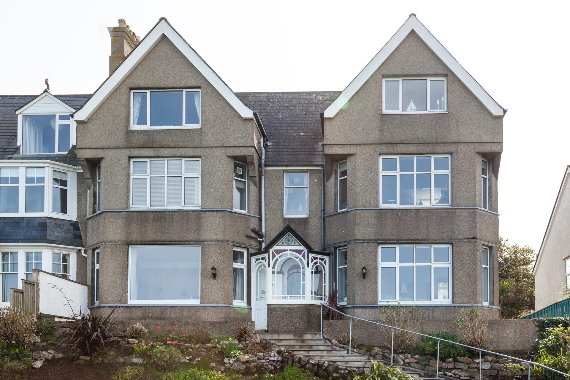 There is an allocated parking space for one car.