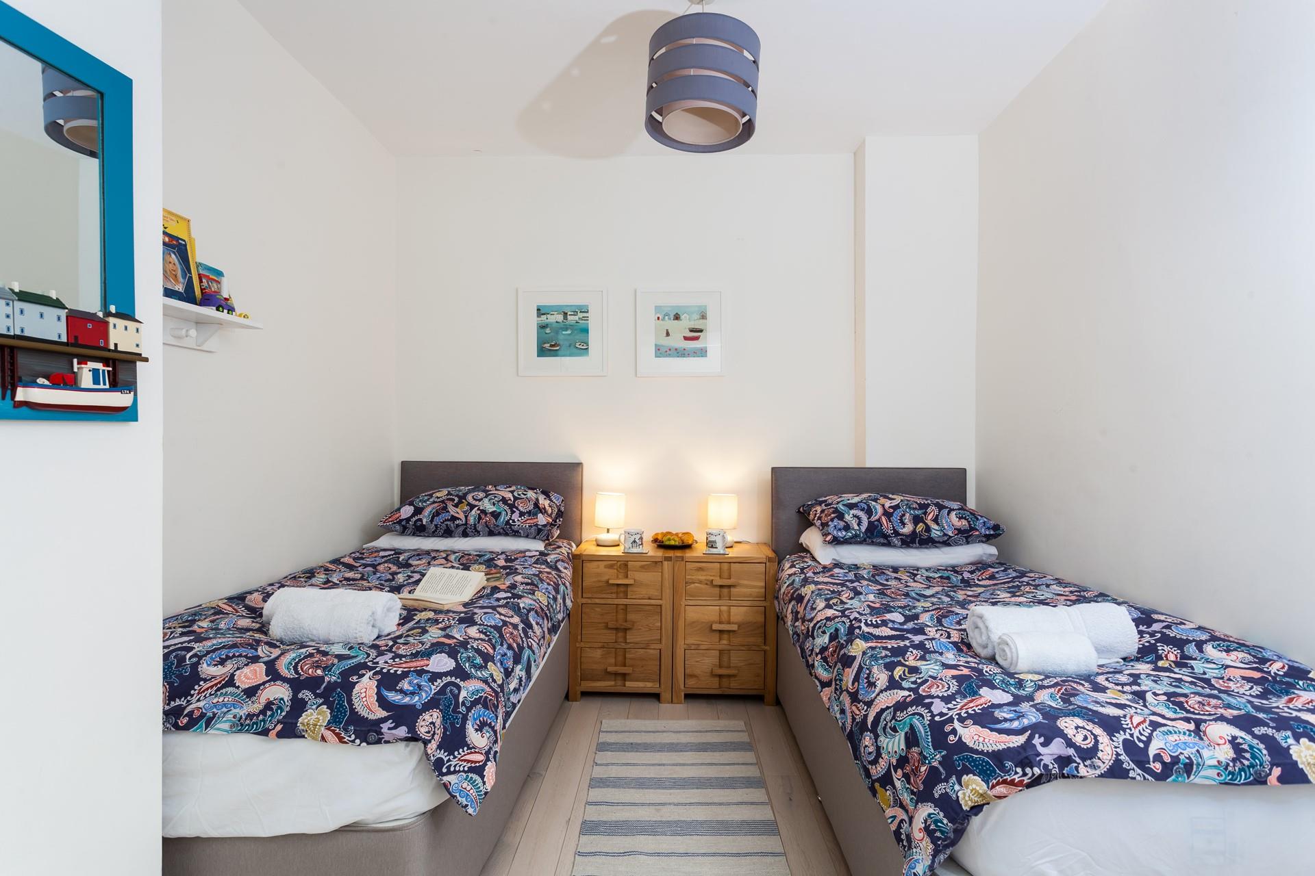 Settle the kids to bed and then relax in the living room with a glass of wine.