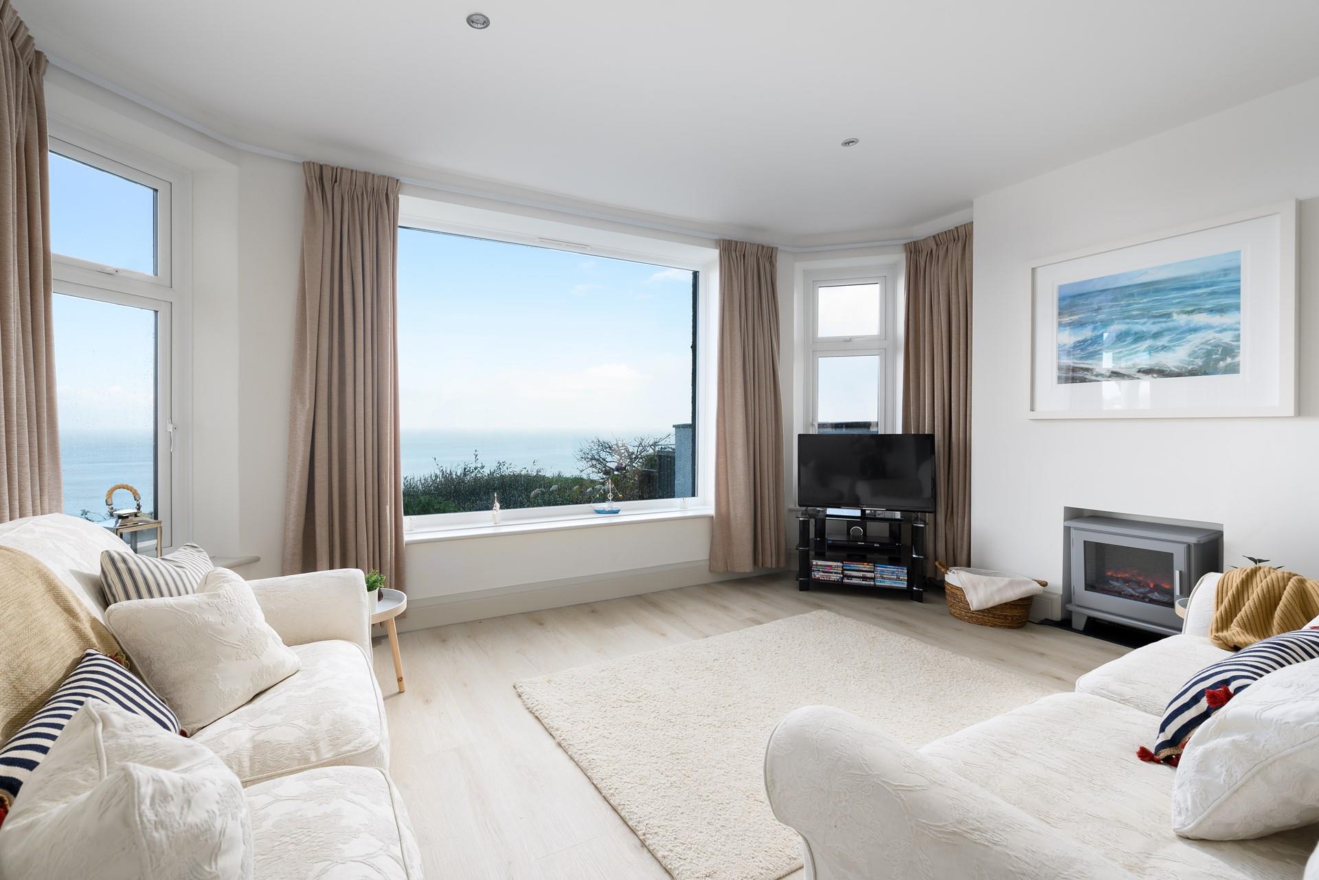 Bright, airy and spacious, the living area is a calm and tranquil spot to relax at the end of the day. 